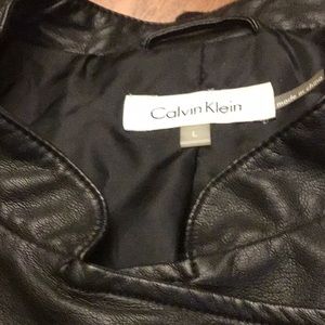 Black motorcycle style jacket. zippers work,